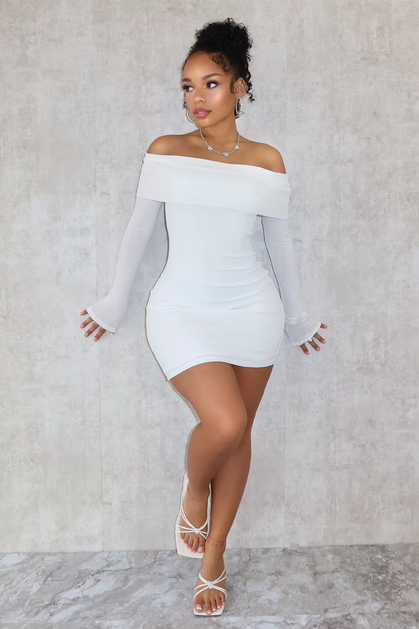 A Classic Off Shoulder Long Sleeve Mini Dress