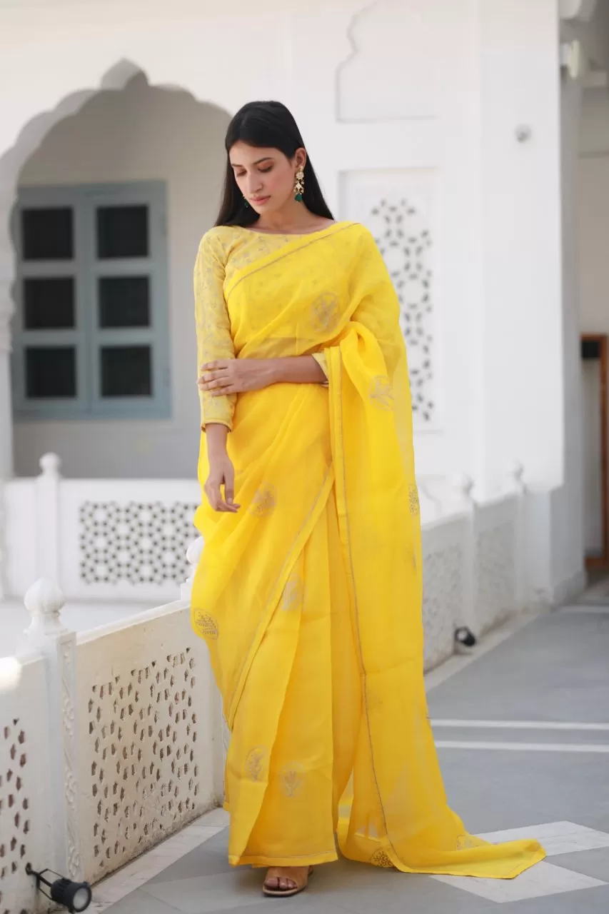 Shreeja yellow viscose silk organza saree