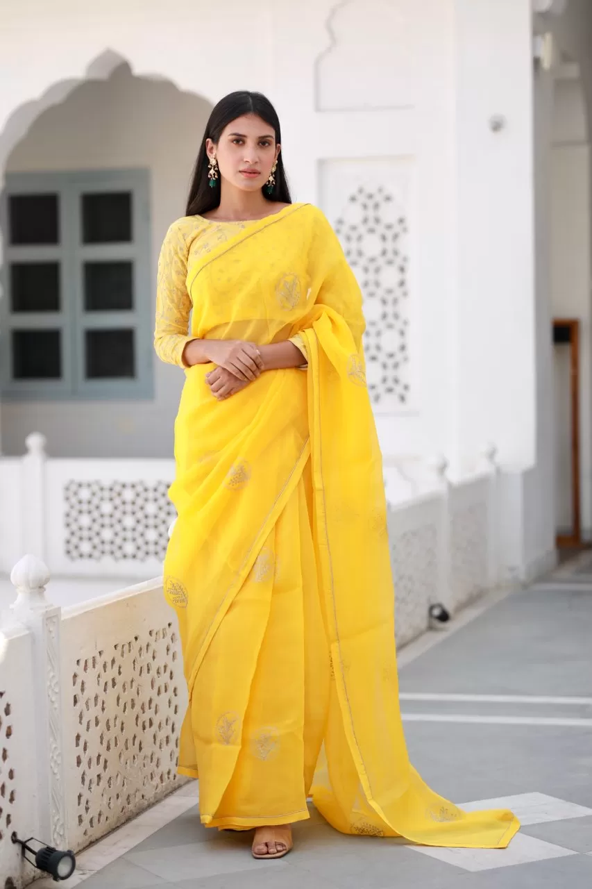 Shreeja yellow viscose silk organza saree